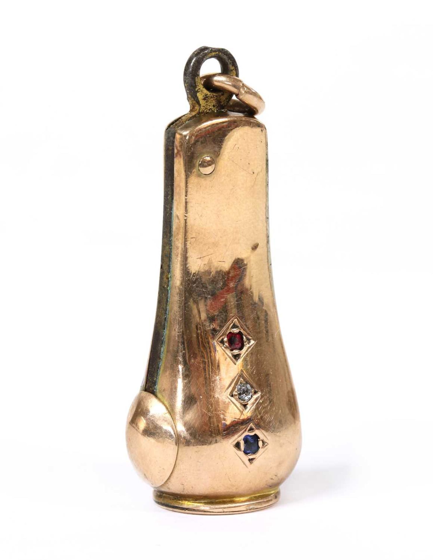 A gold cased gem set cigar cutter,