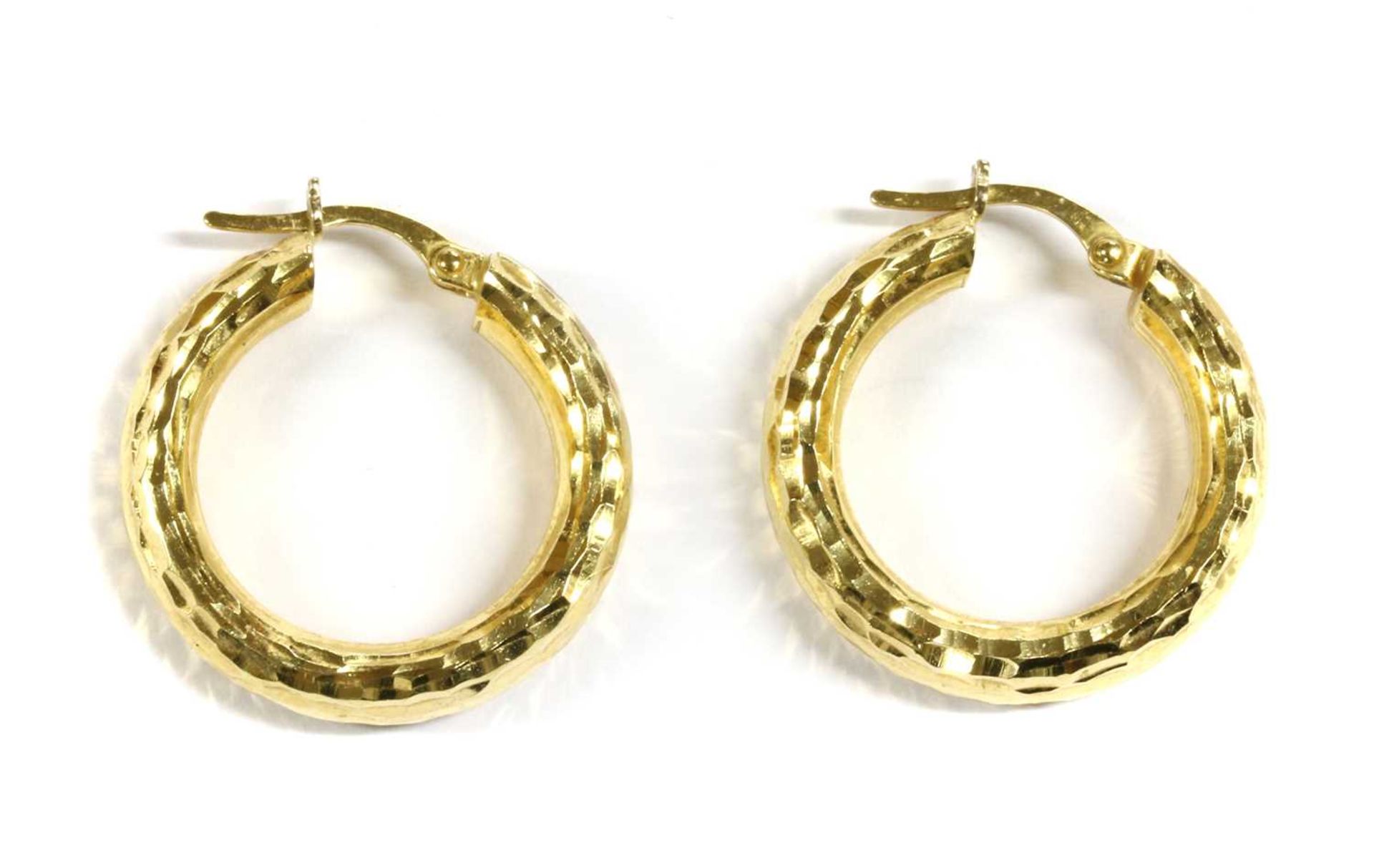 A pair of Italian gold hoop earrings,