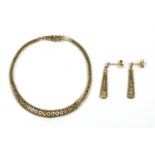 A 9ct three colour gold brick link bracelet and earring suite, c.1980,