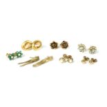 Seven pairs of gold earrings,