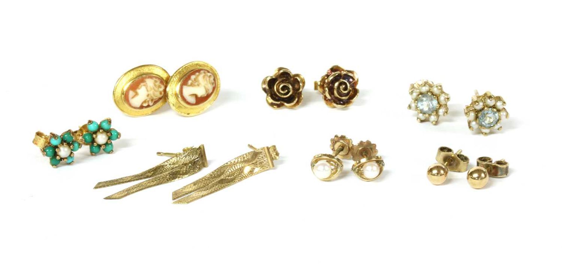 Seven pairs of gold earrings,