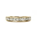 A gold diamond half eternity ring,