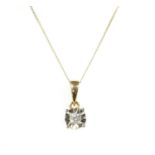 A gold single stone diamond pendant,