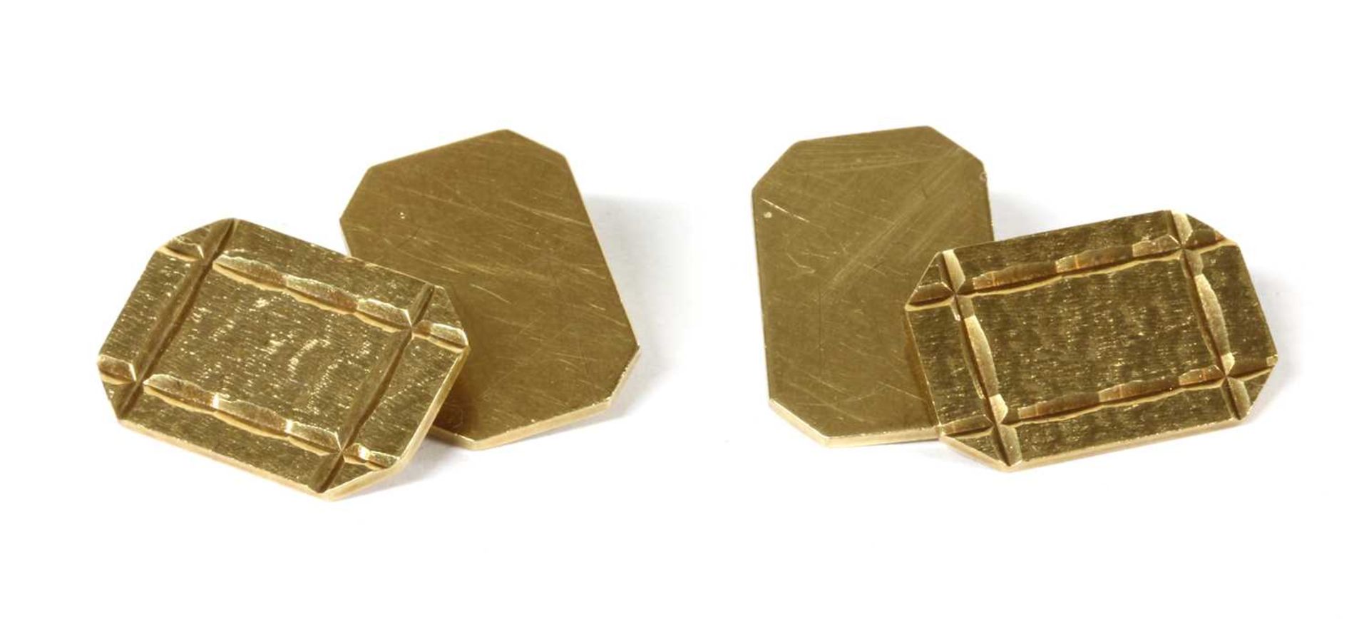 A pair of gold chain link cufflinks,