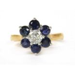 An 18ct gold diamond and sapphire cluster ring,