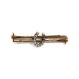 A gold and silver diamond set horseshoe bar brooch,