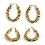 Two pairs of 9ct gold hollow hoop earrings,