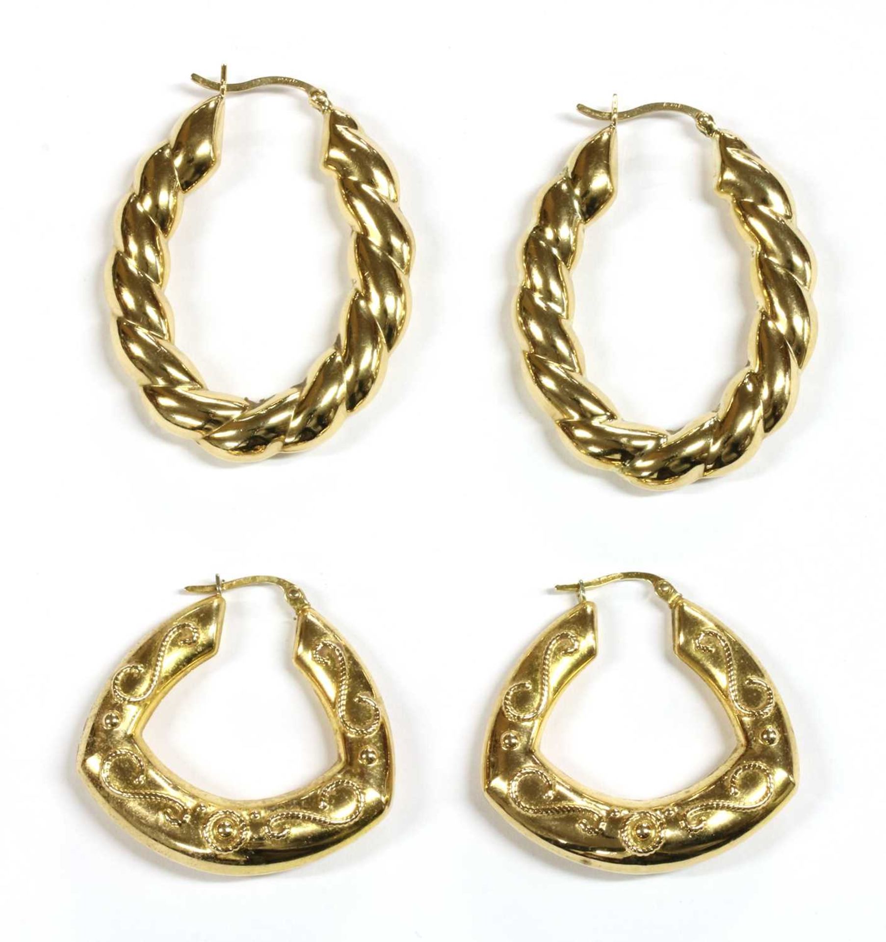 Two pairs of 9ct gold hollow hoop earrings,