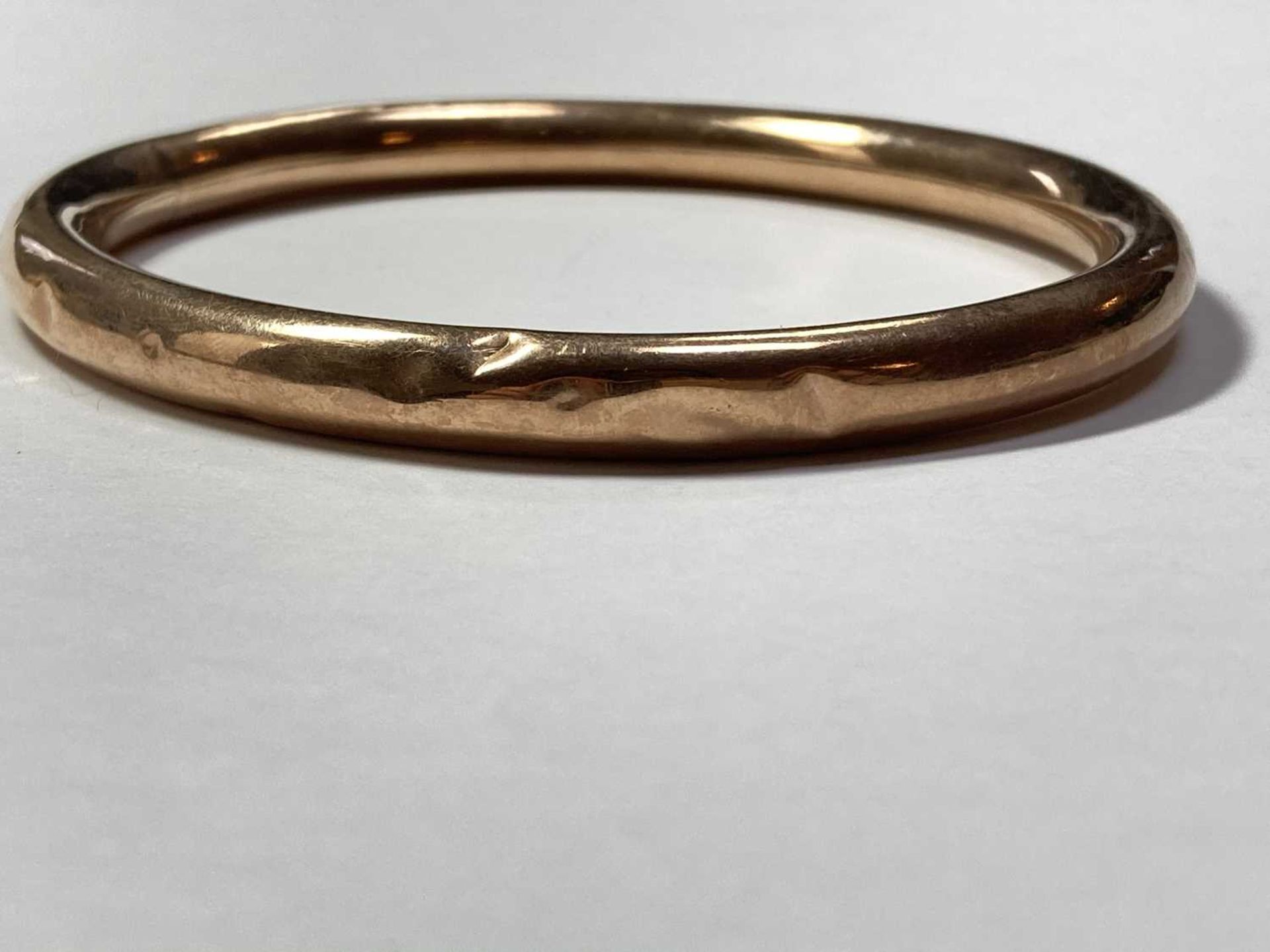 A 9ct gold bangle, - Image 3 of 7