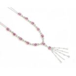 A white gold pink sapphire and diamond necklace,