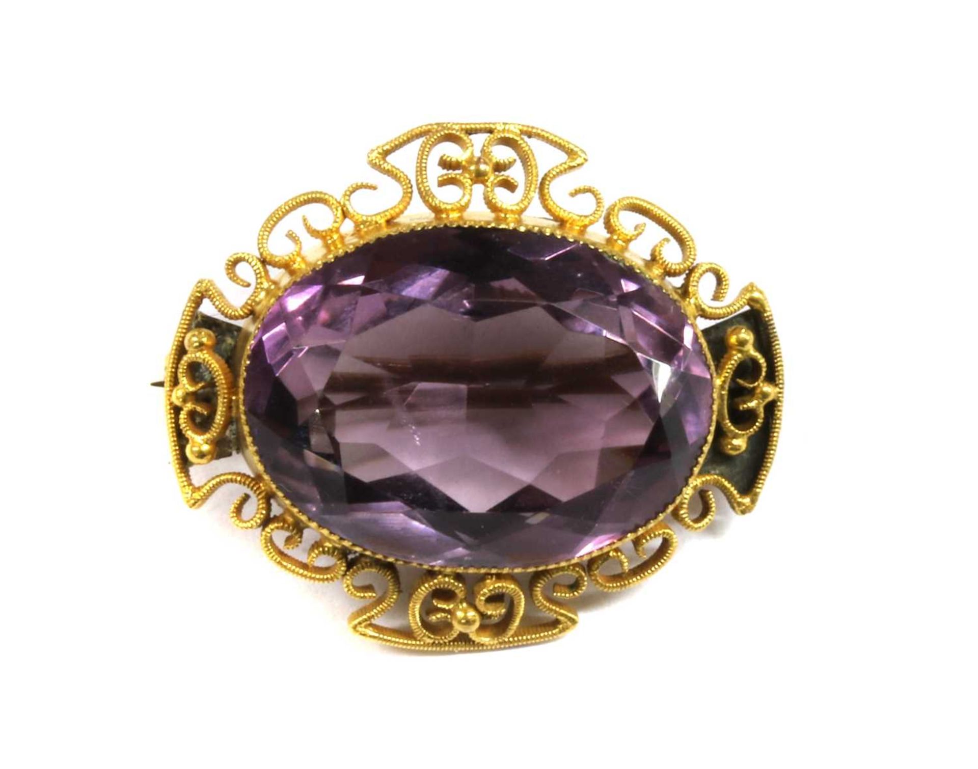 A Victorian gold amethyst brooch,