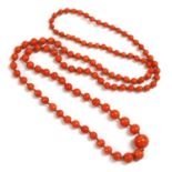 A single row graduated coral bead necklace,