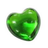 A green glass Baccarat paperweight,