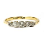 A gold five stone diamond ring,