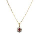 A 9ct gold ruby and diamond cluster pendant,