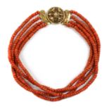 A Dutch four row uniform coral bead necklace,