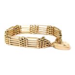 A gold five row gate bracelet,