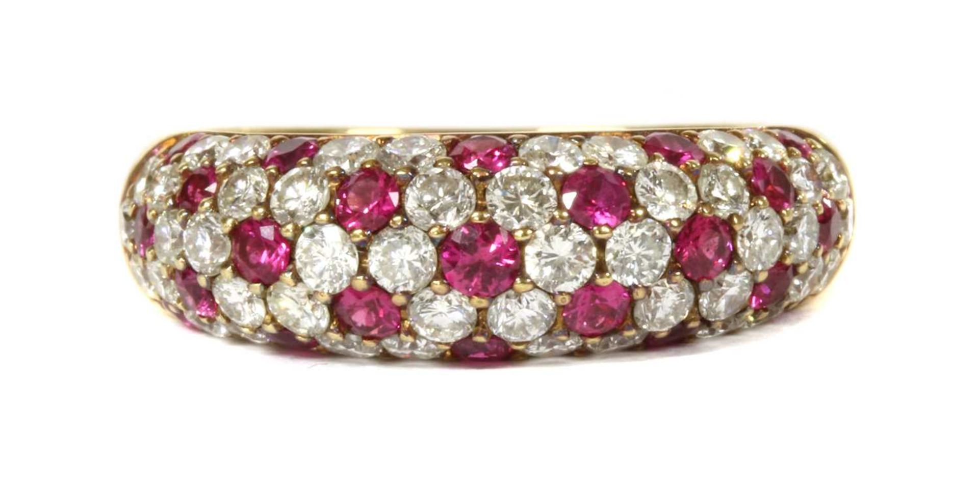 A gold ruby and diamond ring,