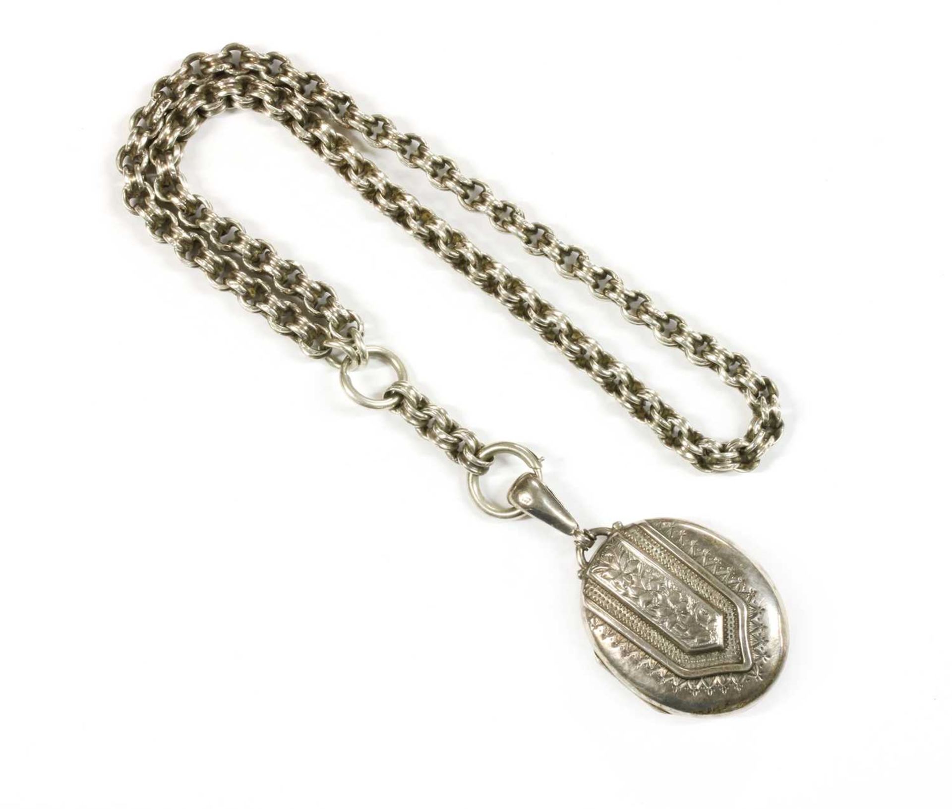 A Victorian sterling silver locket and collar,