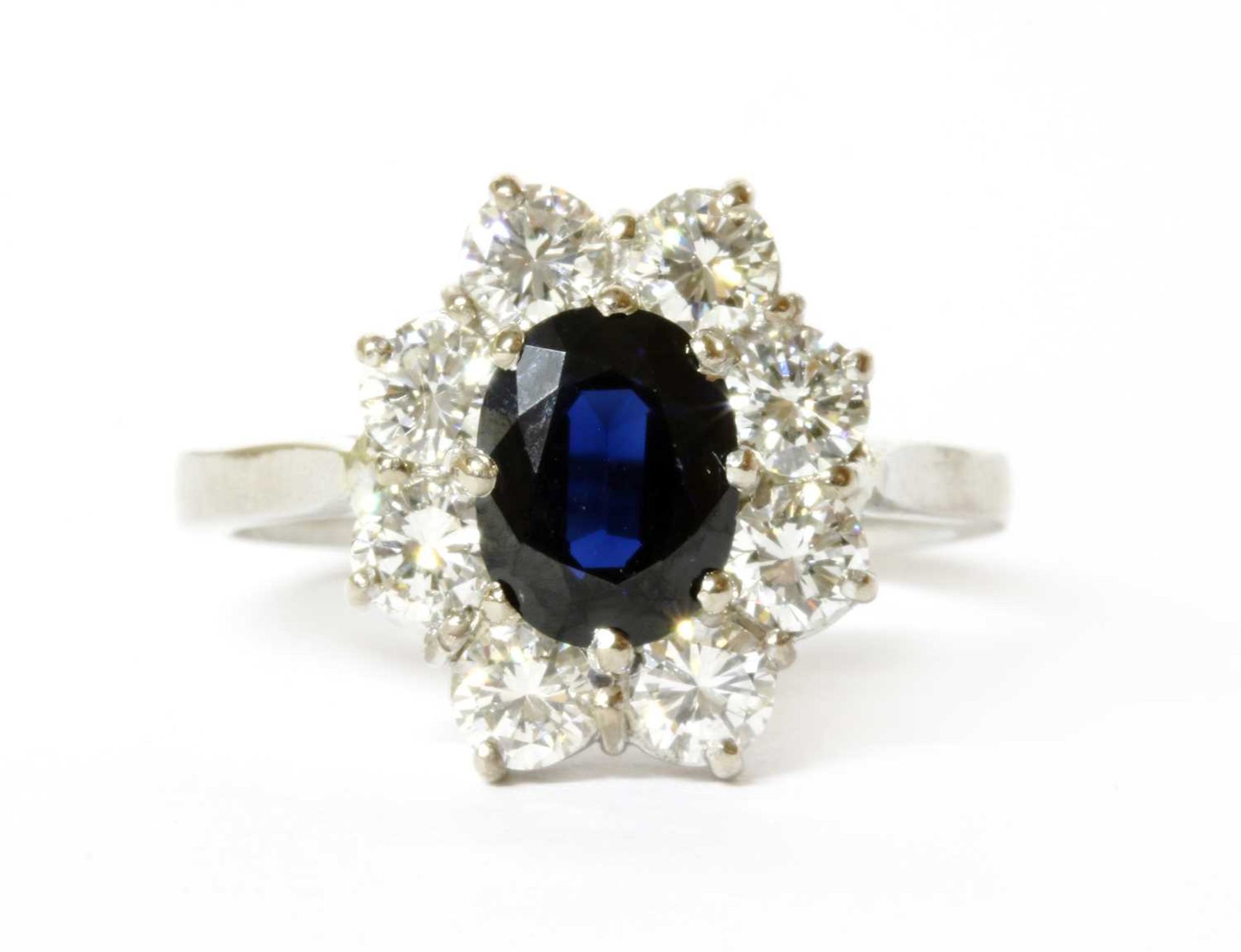 A platinum sapphire and diamond cluster ring,