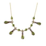 A gold and silver gilt, peridot, amethyst and diamond fringe necklace,