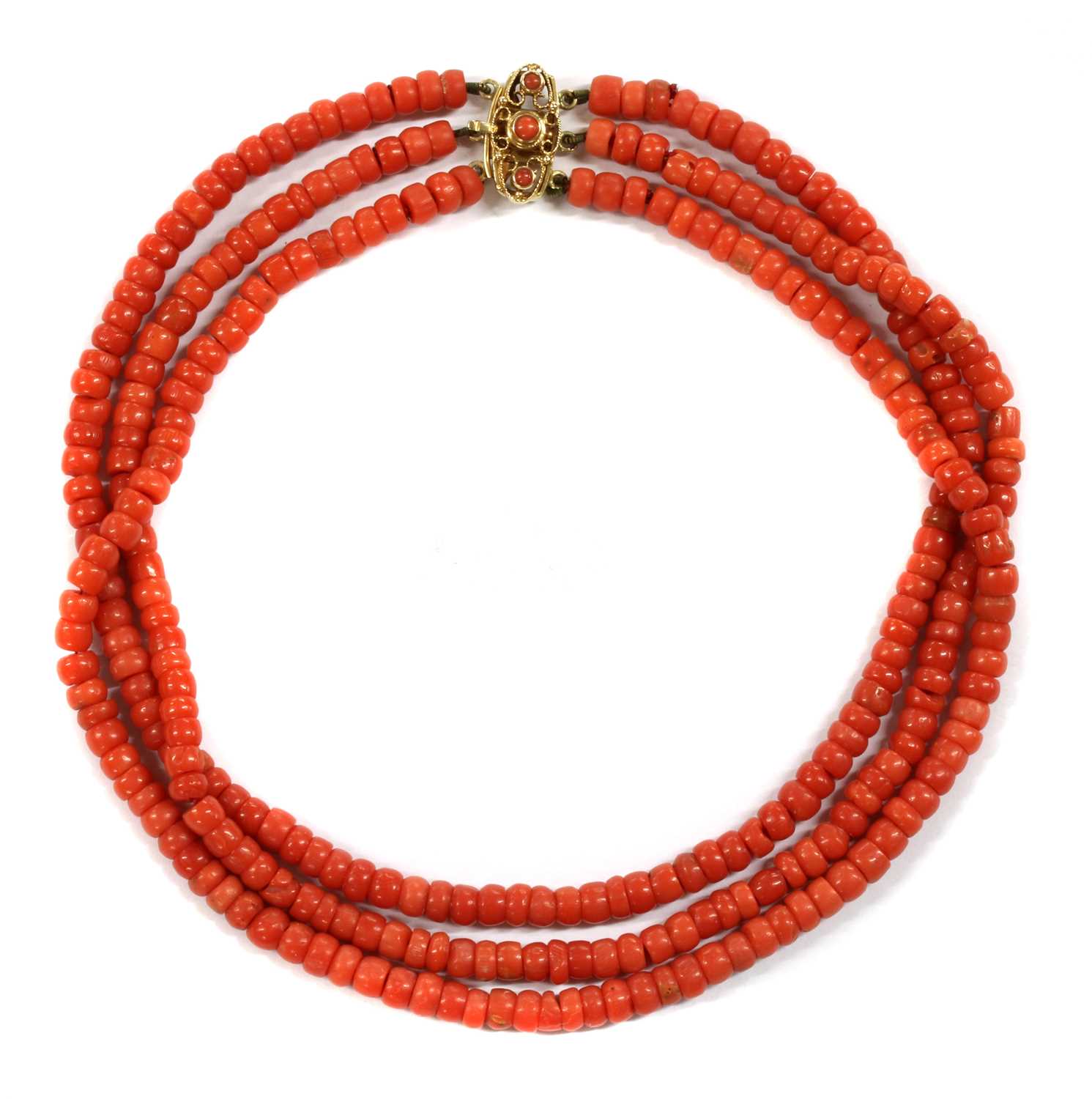 A Dutch three row uniform coral bead choker necklace,