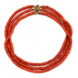 A Dutch three row uniform coral bead choker necklace,