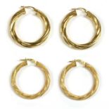 Two pairs of 9ct gold hollow hoop earrings,