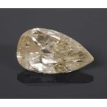 An unmounted pear shaped modified brilliant cut diamond,