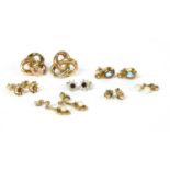 Seven pairs of gold earrings,