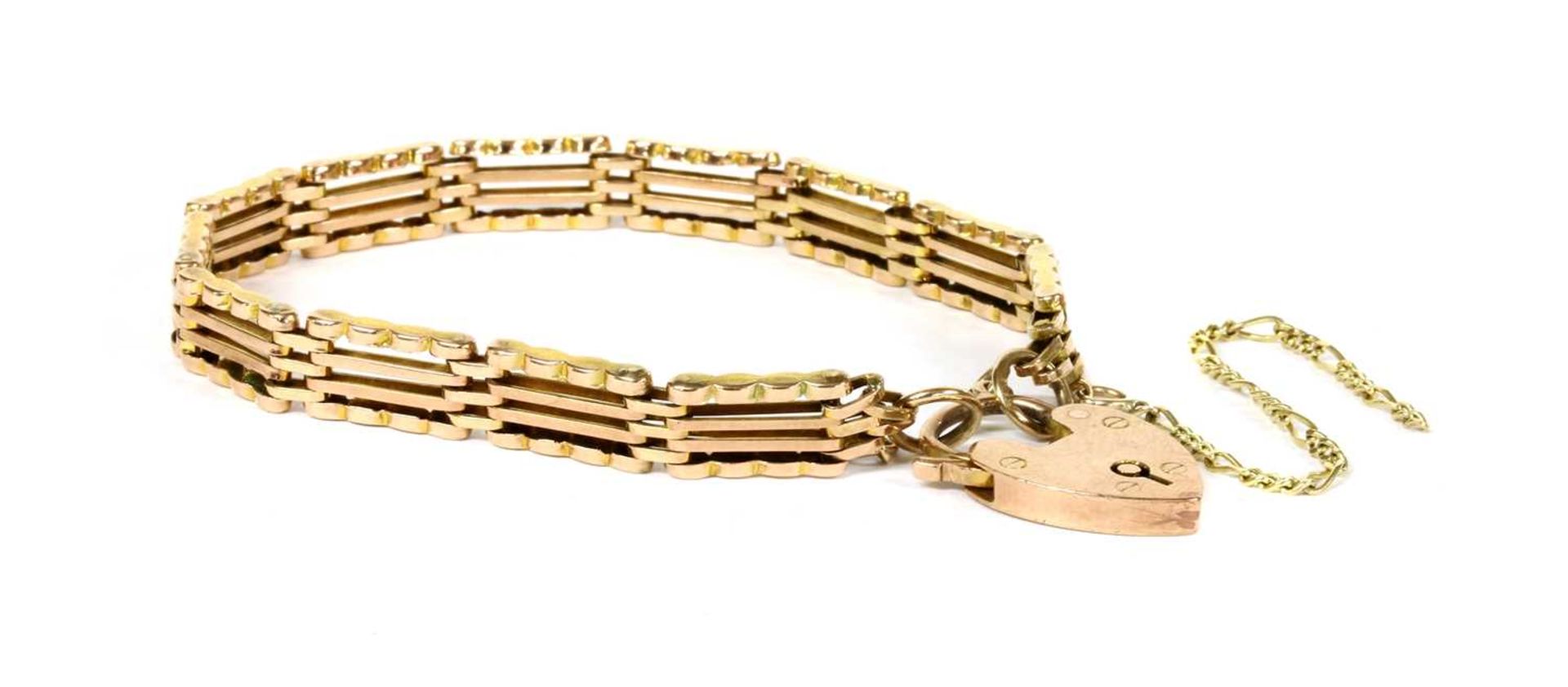 A gold four row gate bracelet,