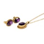 A pair of 9ct gold single stone amethyst earrings,