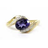 A 9ct gold iolite and diamond ring,