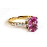 An 18ct gold pink sapphire and diamond ring,