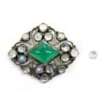 An Arts & Crafts silver dyed green agate and moonstone brooch,