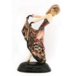 A Goldscheider pottery figure of a lady in a hat,