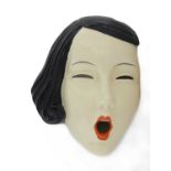 An Art Deco pottery wall mask,