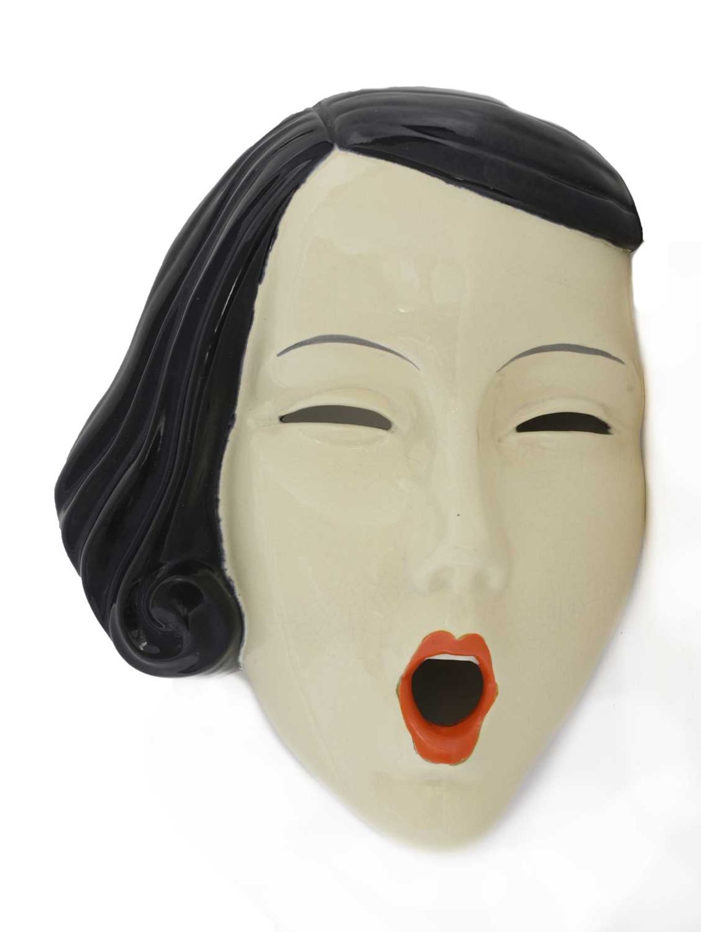 An Art Deco pottery wall mask,