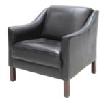 A Danish leather armchair,