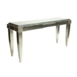 A contemporary silvered console table,