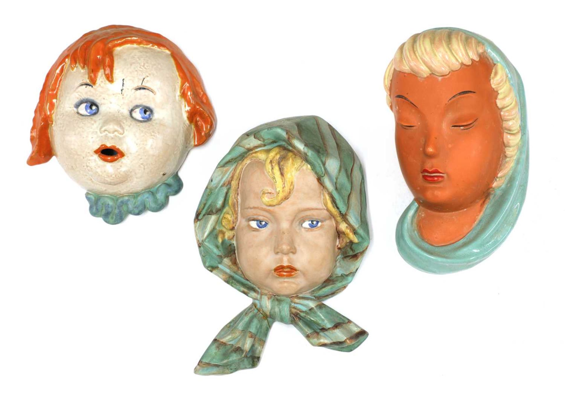 Three Keramos terracotta wall masks,