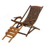 A teak folding deck lounger,