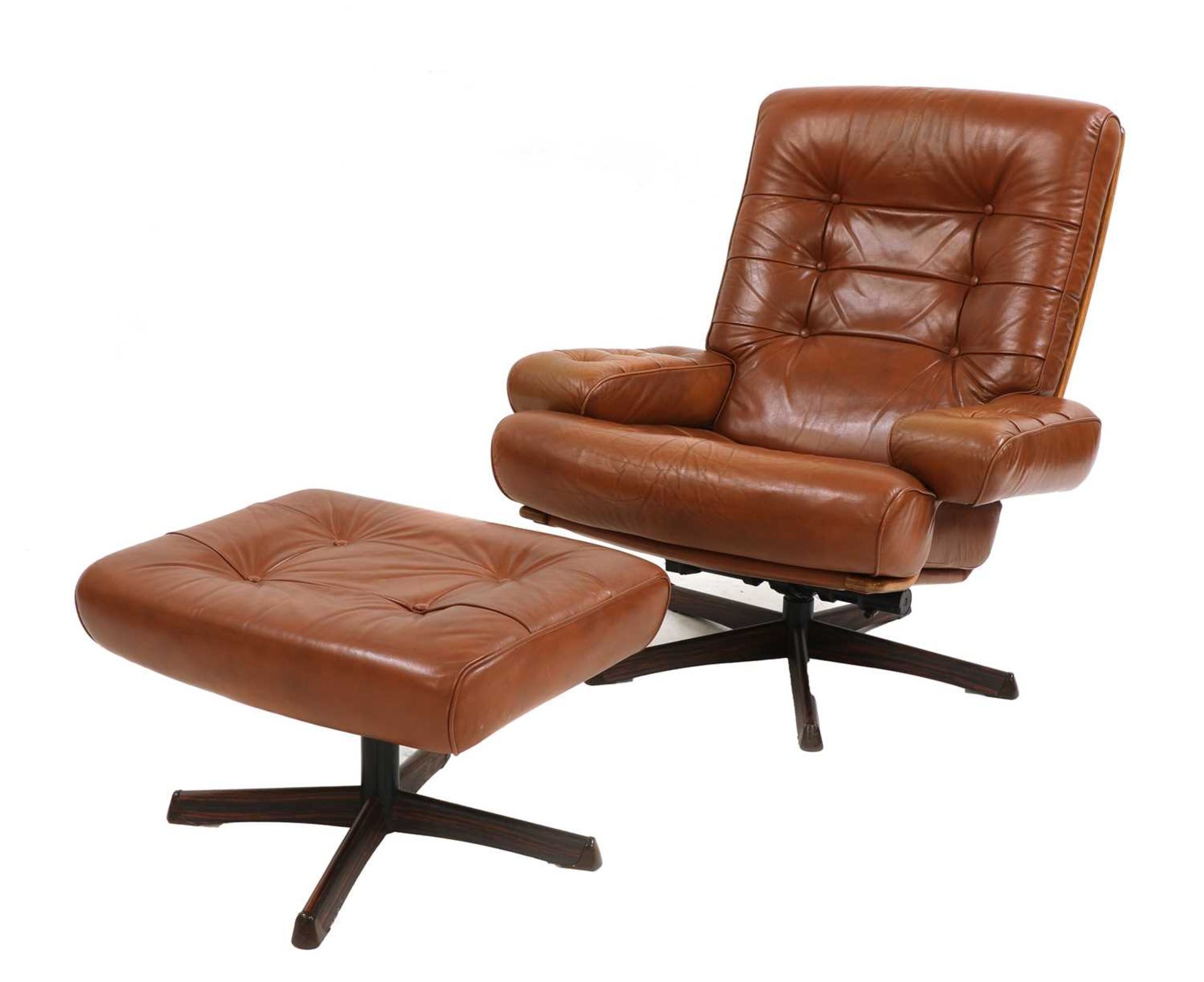 A Swedish leather lounge chair and ottoman,