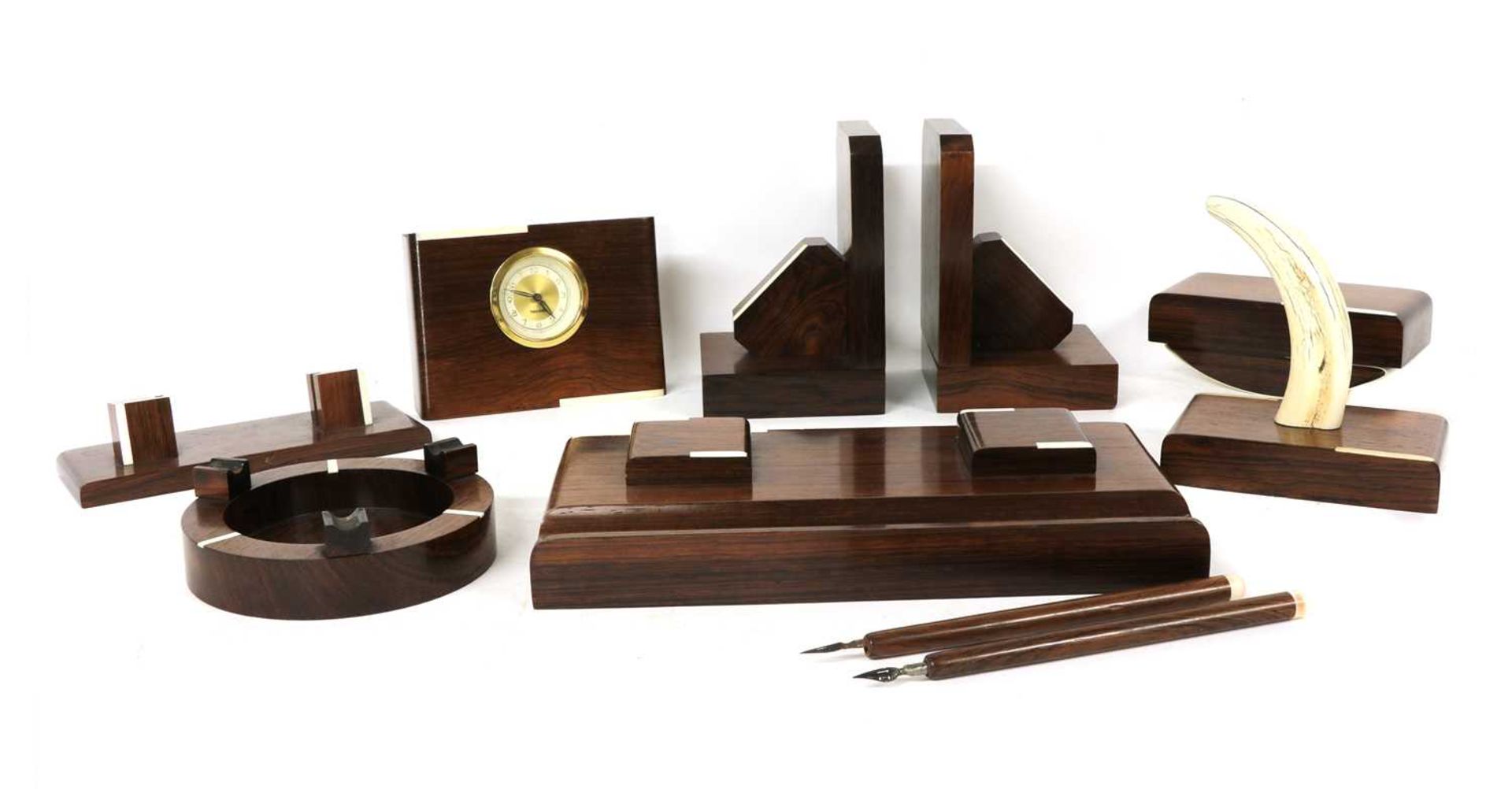 A French Art Deco rosewood and ivory mounted desk set,