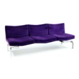 A pair of purple upholstered settees,