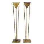 A pair of Art Deco-style brass uplighters,