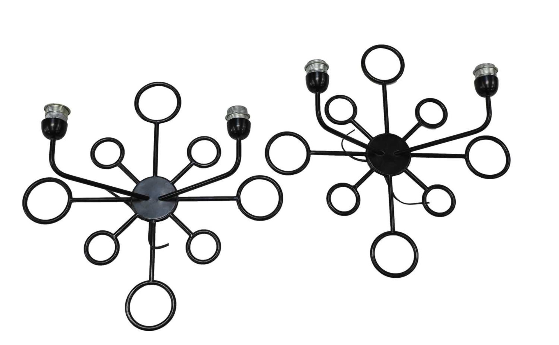 A pair of contemporary black powder-coated wall lights,