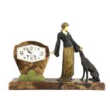 An Art Deco bronze and marble mounted mantel clock,