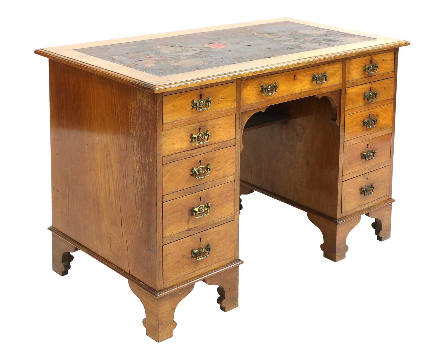 An Arts and Crafts walnut desk,