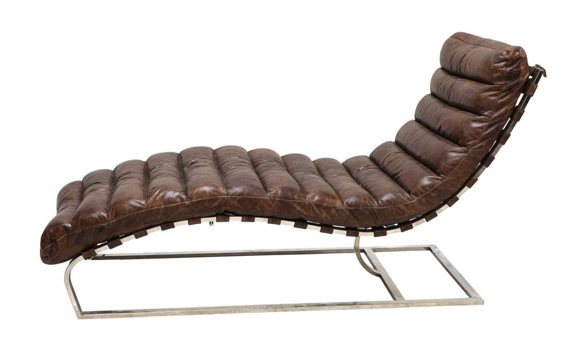 A tan leather and chrome lounger,